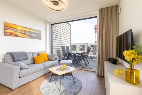 Marienleuchte Apartamento | BeltBlick 24 – Moderne Ferienwohnung mit Dachterrasse und Meerblick!
