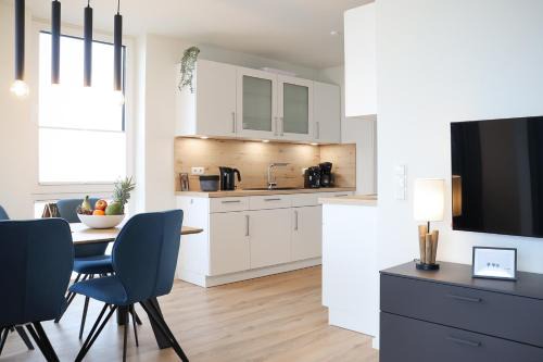 Marienleuchte Apartamento | BeltBlick 4 - Moderne Ferienwohnung direkt am Strand mit Sauna und Meerblick!