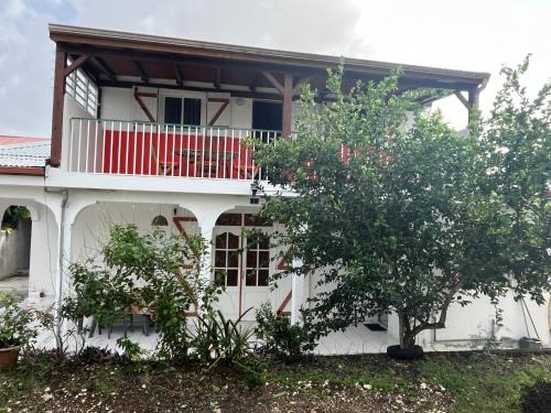 Le Moule Casa | Bercé Par Le COCOTIER Meublé 2 chambres