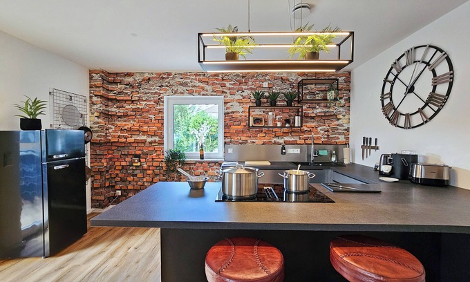 Altusried Apartamento | better I industrial apartment I home theater