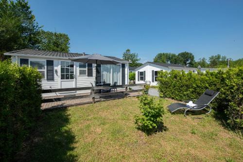 Oisterwijk Chalet De Esquí | Bicycle Storage - Close to Efteling & Safaripark Beekse Bergen & Parking!