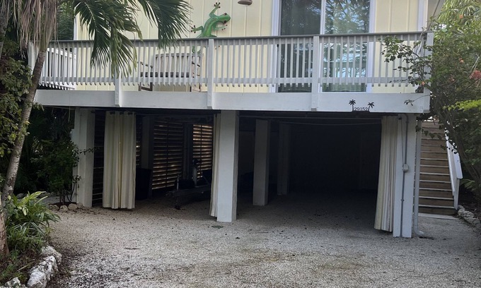 Eden Pines Casa | Big Pine Key Paradise Canal front fenced yard.