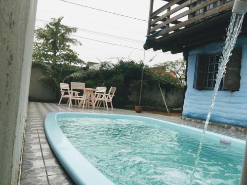 Vila Nova Casa | Biocasa com piscina a 1 quadra e meia da Praia