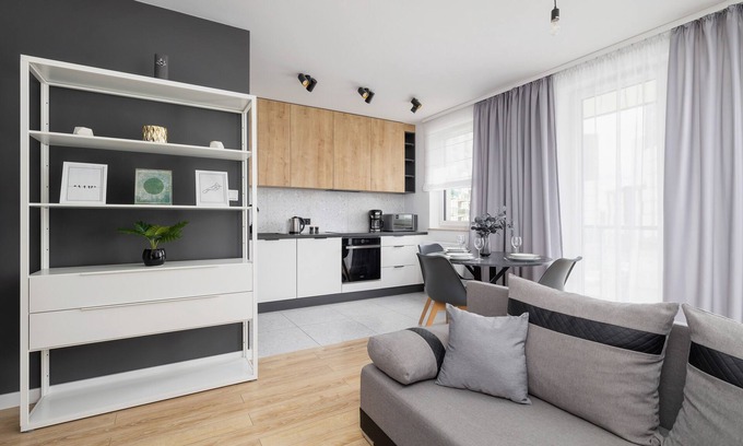 Grzegorzki Apartamento | Black and Grey Apartment by Renters