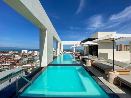 Colonia 5 de Diciembre Casa | Blissful Ocean-View Penthouse with Rooftop Pool