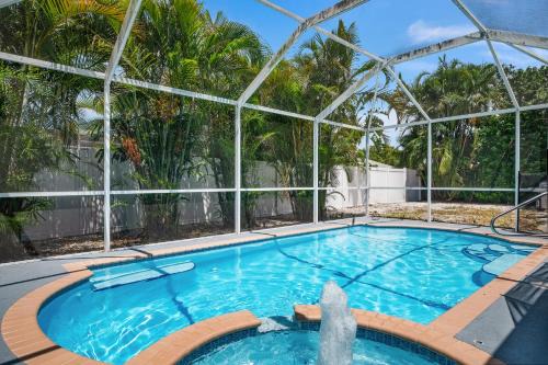 Bradenton Casa | Bloom Lagoon! Tropical home with heated pool and grill! Pet Friendly!