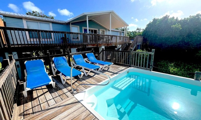 Cudjoe Key Casa | Blue Vacation Home, piscina privada climatizada, muelle.