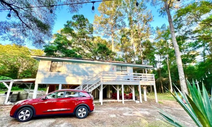 Fellowship Casa | Blue Sky StiltsHouse in a Secluded Forest.