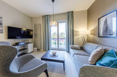 Ostseebad Wustrow Apartamento | Boddenzeit - Moderne Ferienwohnung mit Nordbalkon, Wellnessbereich und Nähe zum Ostseestrand