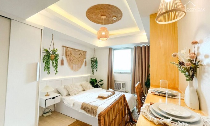 San Fernando Condominio | Boho-Themed Studio with Pool View Balcony, Netflix, Karaoke & Boardgames