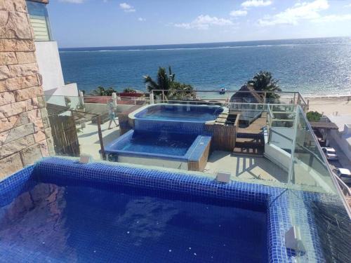 Puerto Morelos Apartamento | Bonita habitación con pequeña piscina a aire libre