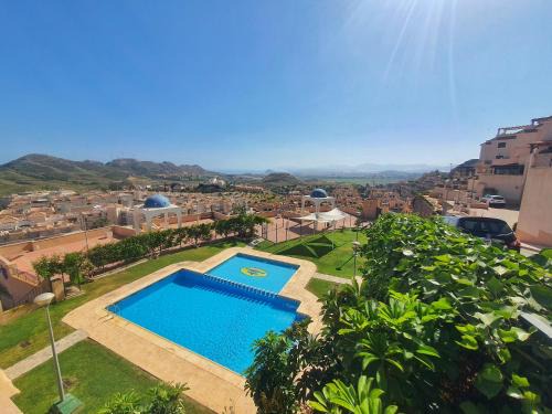 Los Geraeos Apartamento | Bonito apartamento con terraza, piscina y vistas - by Aloha Palma