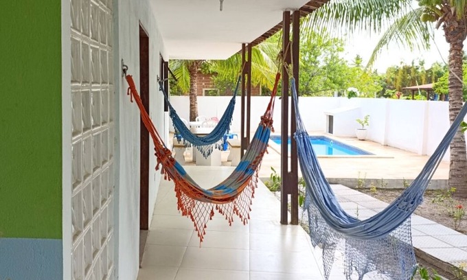 Loteamento Enseada dos Golfinhos Casa | Beach, pool and barbecue with tranquility and privacy a hundred meters from the sea!