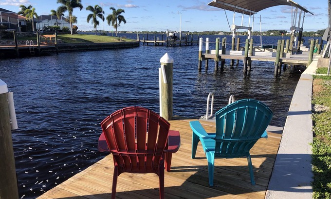 Gulf Cove Casa | Breath taking canal, pool home with golf access. 15 minutes from beaches.