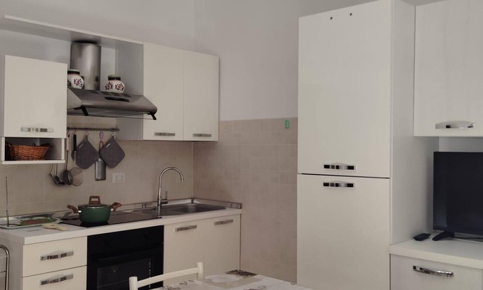 Porto Garibaldi Apartamento | Bright one-bedroom apartment with kitchen near beaches and canal port.