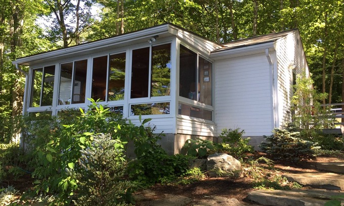 Raymond Cabaña | Bright and cozy waterfront home on Panther Pond with stunning lake views!