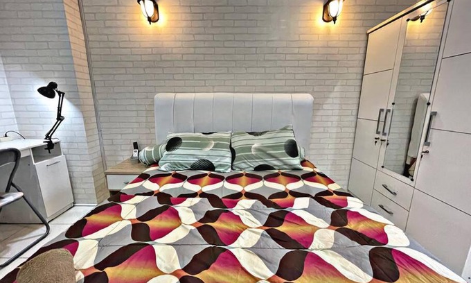 Pluit Apartamento | Bright cozy studio 1BR Cityview, SmartTV,FAST Wifi at Greenbay Pluit