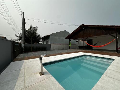Salinas Casa | BS01- Casa com Piscina Aquecida e Churrasqueira