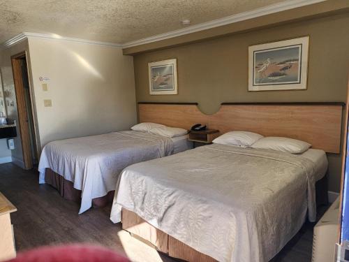 Corcoran Hotel | Budget Inn