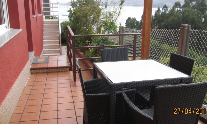 Bueu Apartamento | Bueu: Apartamento con terraza y vistas al mar a 300 metros de la playa