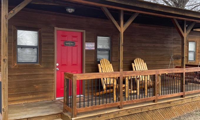 Branson Cabaña | Buffalo River Cabin has 1 bedroom with queen size bed, 1 twin bunk bed in hallway, 1 futon in main l