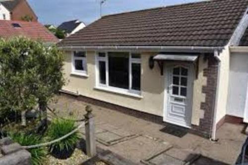 Mumbles Apartamento | Bungalow a few minutes from the sea.