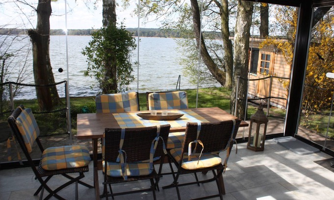 Bad Saarow Casa | Bungalow directamente en el lago con jardín de invierno, muy privado - Ferienhof Löschebrand