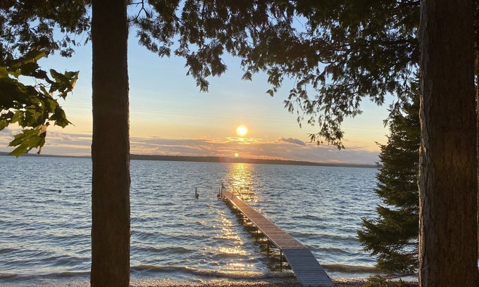 Cheboygan County Cabaña | Burt Lake, Lake Front Family Vacation Home, 4BR-2BA, Amazing Sunsets!