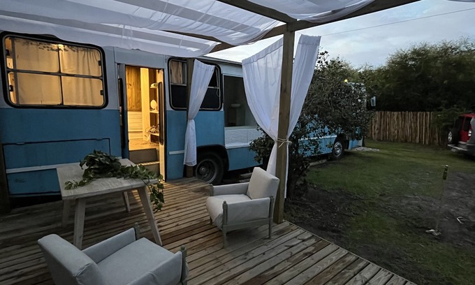 Armacao Casa | Bus house on the riverfront