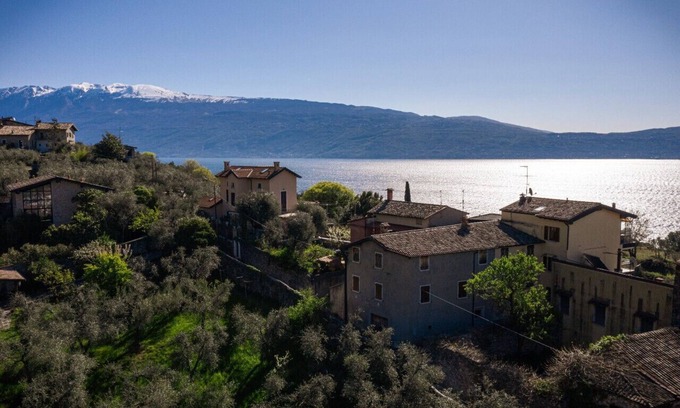 Pulciano Apartamento | Ca' Isabella Rebomaholidays - with terrace and marvellous lake view