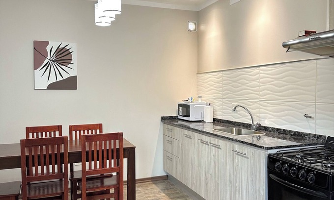 Cerro Calafate Cabaña | Cabaña con 3 habitaciones, excelente vista a los cerros