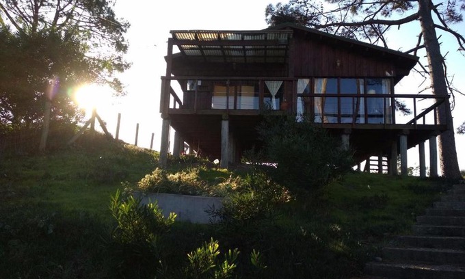 Pinamar Casa | Cabaña en la playa. ventanales y terraza al mar