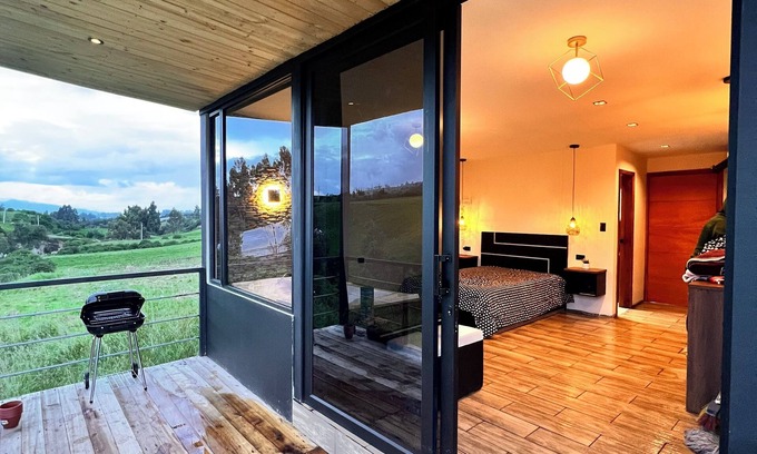 Cangahua Cabina | Cabaña junto al río con vista a nevado Cayambe