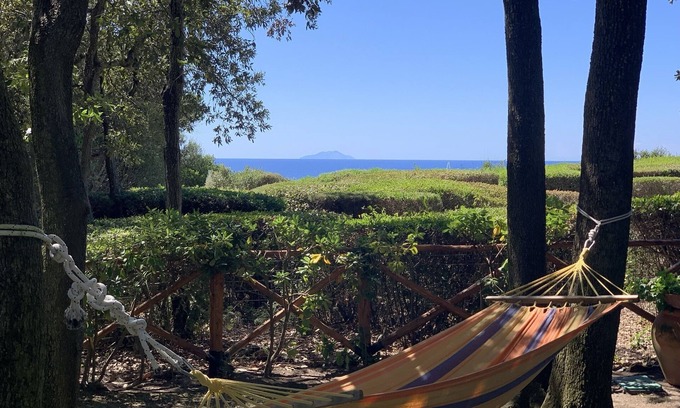 Punta Ala Casa | Cala Dei Pirati. Garden cottage with sea view on the Tuscan archipelago