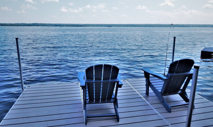 Seneca Falls Casa | Calm on Cayuga. Lakefront home on Cayuga Lake with dock and screened in porch