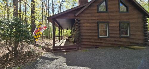 Swanton Casa | Camp Valentine- charming 3 bedroom cabin with hot tub and fireplace in private setting
