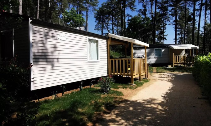 Ucel Casa | Camping Ushuaïa Villages les Pins d'Ucel **** - HIRONDELLE - mobile home 28 m² + TV for 5 to 6 people - 5 people. included in the price