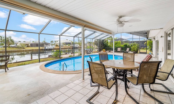 Edgewater Casa | Canal-front home with deep-water dock, pool, lanai, & central AC - snowbirds OK
