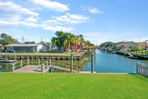 Butler Beach Casa | Canal Front Home! Walk to Beach, Porch, Fishing
