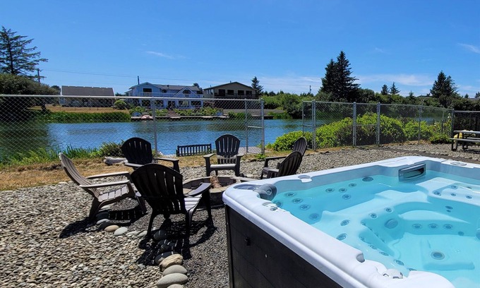 Ocean Shores Casa | Canal Front - Hot Tub, Private Dock, Fully Fenced!