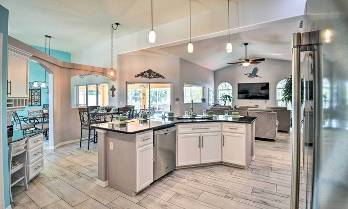 Palm Coast Casa | Canalfront Home w/ Heated Pool & Theater Room!