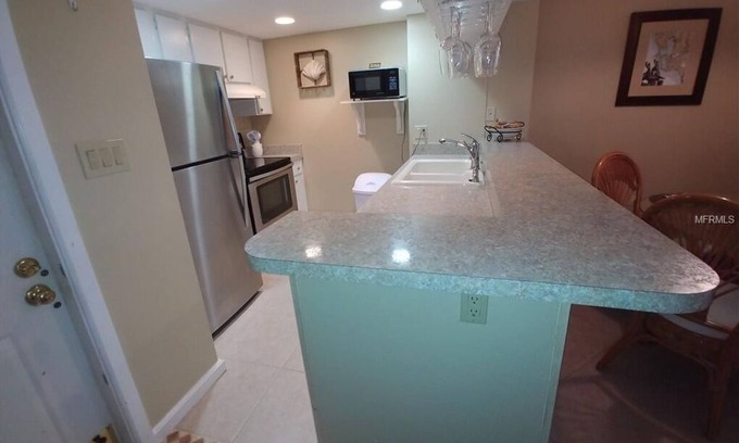 Burnt Store Marina Condominio | Captain's Quarters- Burnt Store Marina- ¡trae tu poder o veleros!