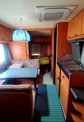 Mocenok Otro | Caravan in the backyard