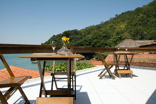 Trindade Casa | Casa 1 - Você a Varanda e o Mar na Praia dos Ranchos-Trindade Hospeda