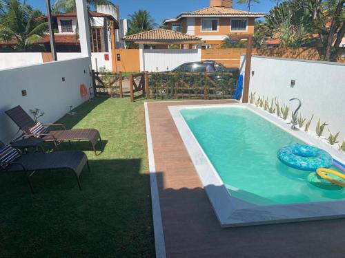 Vera Cruz Casa | Casa 4 suítes com piscina Condomínio Lagoa Dourada Ilha de Itaparica BA