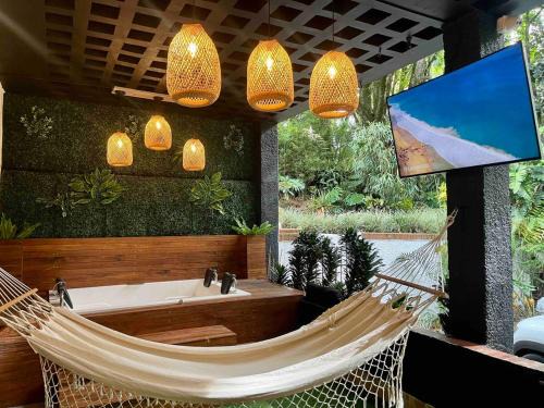 El Tesoro Casa | Casa Amsterdam with Jacuzzi in Poblado Medellín