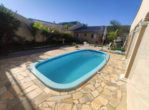 Guaratuba Casa | Casa Arejada com piscina para momentos em família
