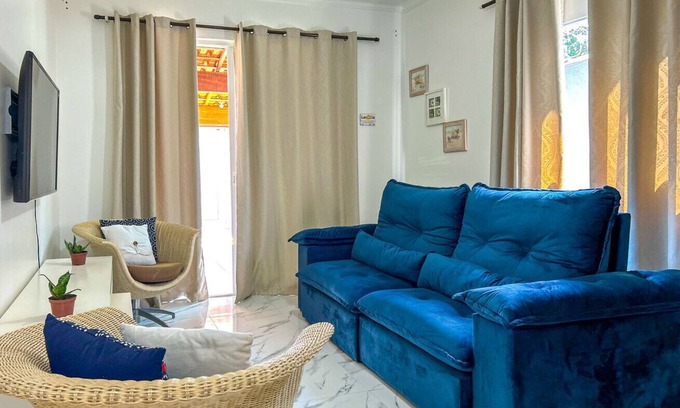 Vista Linda Casa | Casa c ótima localização e Wi-Fi em Bertioga/SP
