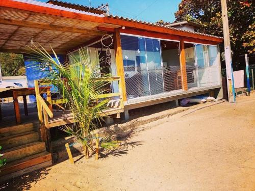Ribeirao da Ilha Casa | Casa charmosa pé na areia por do sol