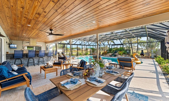 Cocoa Isles Country Club Casa | Casa Coco Retreat w/Heated Pool & Outdoor Kitchen!